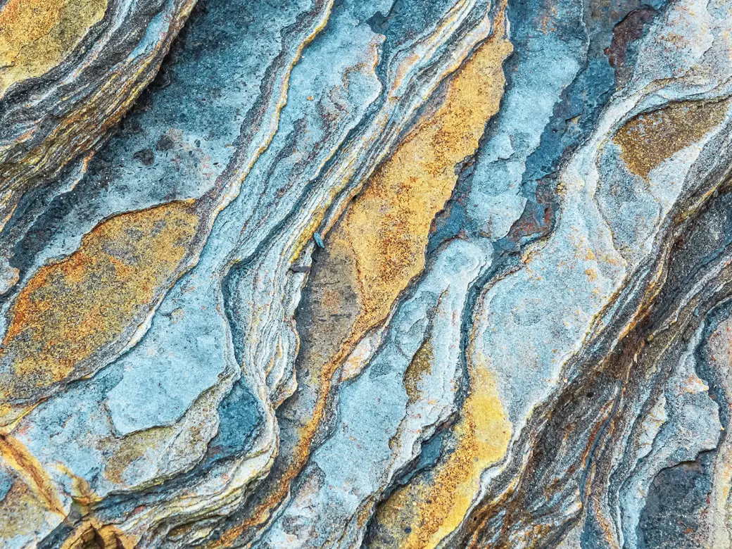 Image of colorful rock layers in close-up 